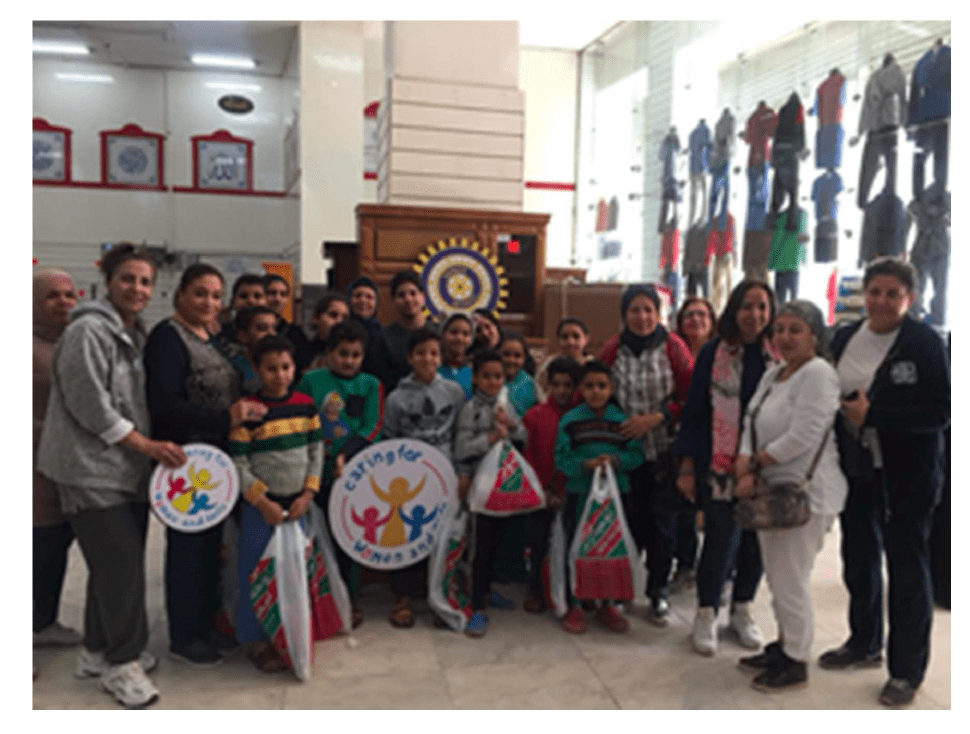 GEZIRA SPORTING 8 DISTRIBUTING CLOTHES FATMA ZAHRAA A-min