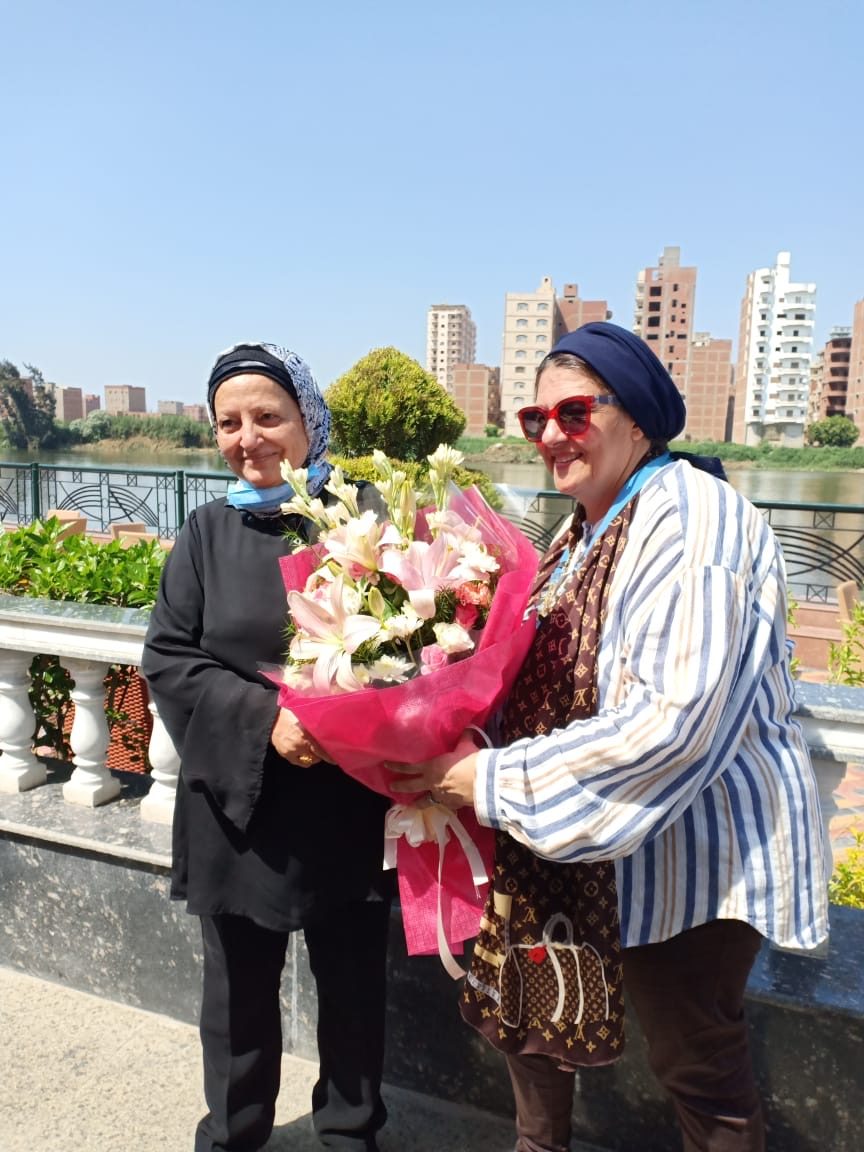 1-Mrs. Nariman Abdullah Past President & Mrs. Nagwa Kandil The new Presient