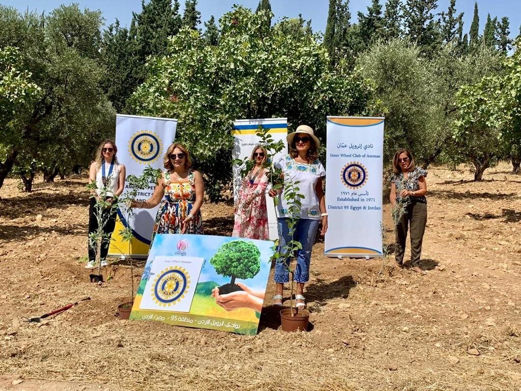 1-Presidents of IWC of Amman, ,Philadelphia and Petra Plantig a tree