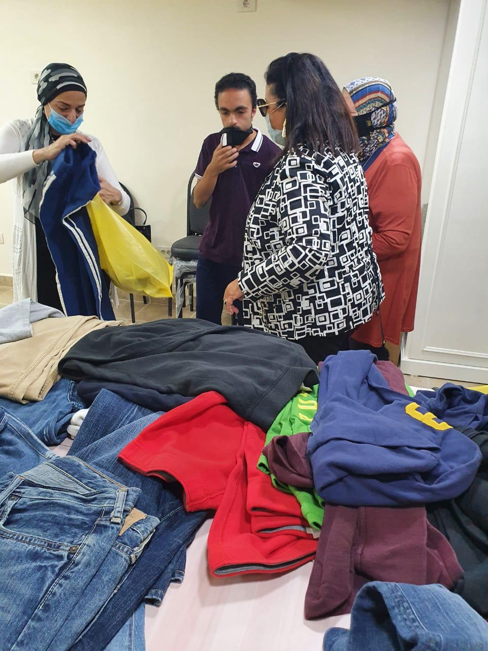 Members of IWC of Alexandria distribute clothes at the Mental Heath Service (2)