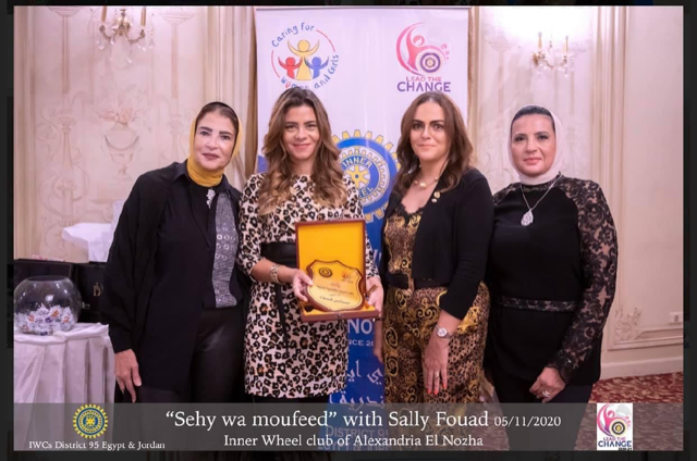 1-Iman El Gamal President of IWC Alexandria El Nozha presented a Shield of appreciation to SallyFouad