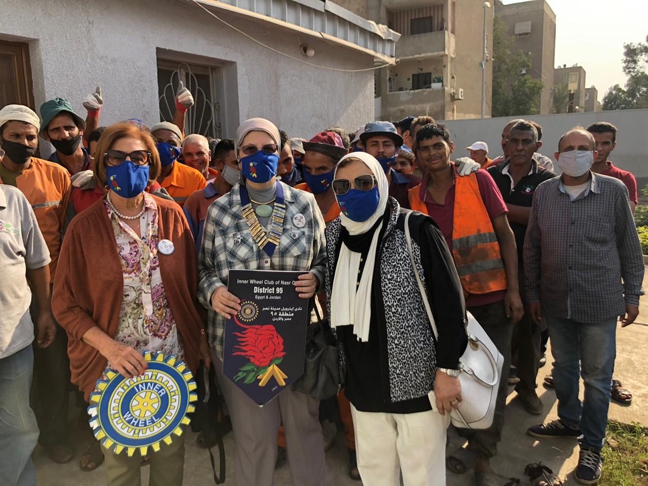1- President of IWC of Nasr City ,some members with the cleaners