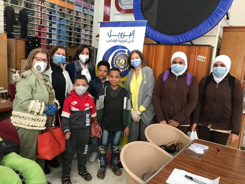 1- Members of IWC of El Gezira Sporting Club at Fatma El Zahraa School