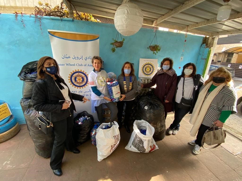 1-2- President & members of IWC of Amman collecting Plastc cups & tins 2