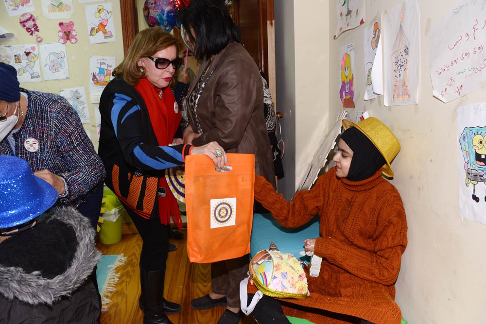 Mrs. Mona Abu El Fettouh offered gift to EB child