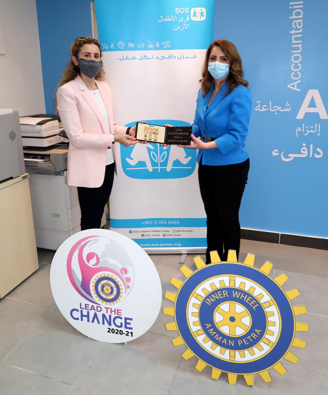 1-Mrs. Nancy Afram, Director of SOS Children's Villages, presented the SOS shield to Mrs. Chehabi in appreciation of their generous donation.