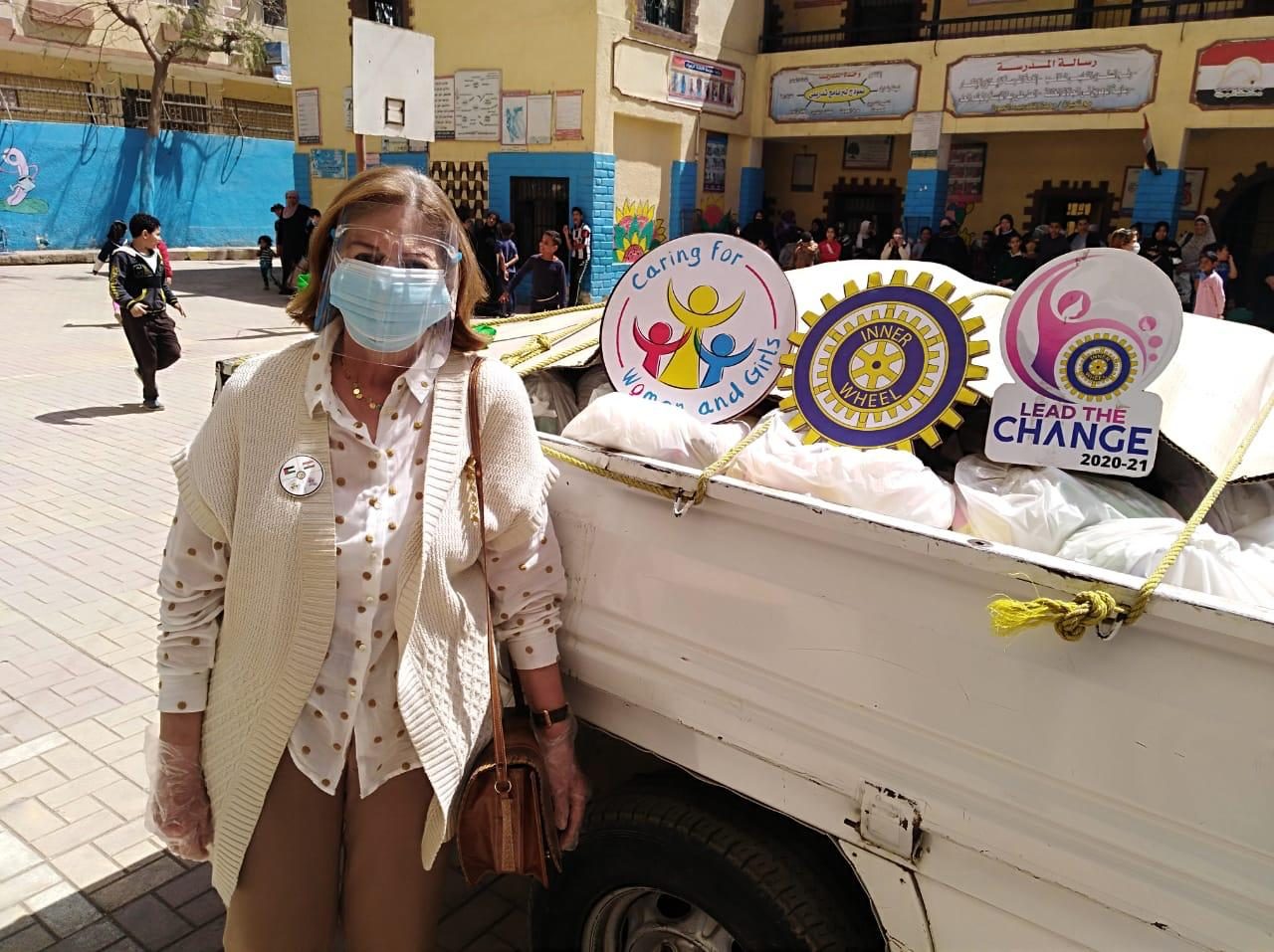 1-Mrs.Nihal el Refaii on behalf of the President & club members at Fatima El Zahraa primary School