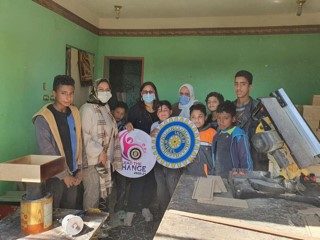 1- President & members of IWC of Alexandria Sporting at the Carpentry Workshop