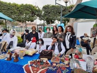 1- Members of IWC of Lotus Misr in cooparation with Awladna foundation organized a bazaar