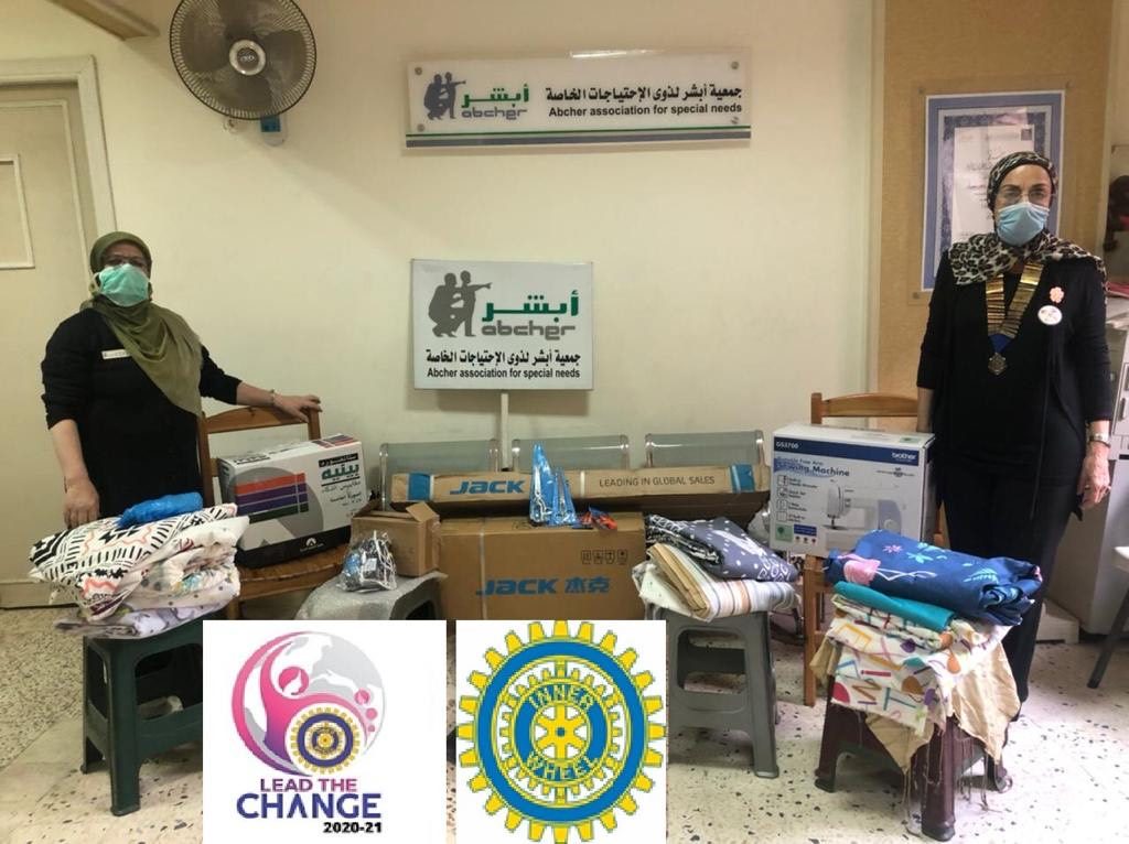 1-President of IWC of Alexandria donating sewing machines & sewing material to Abcher Association for Special Needs