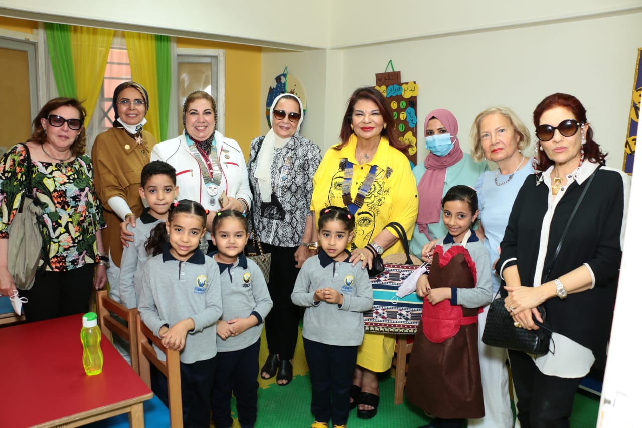 6- Mrs. Mona Aref& Mrs. Amia Aboul Fetouh at the nursey with the Children