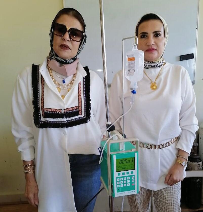 Iman El Gamal President of IWC of Alexandria El Nozha & the Syringe pump device
