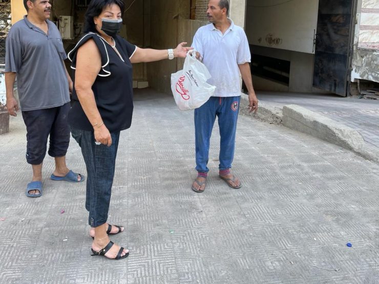 1- Mrs. Enas Al- Imam Distributing meat Packages