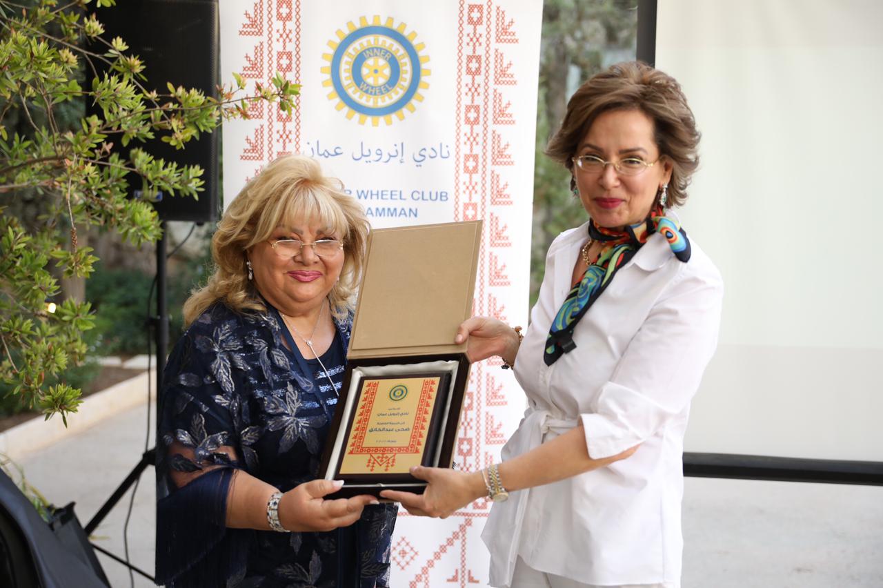 3- Mrs. Noha Asfour Past President Presented a Shield of the Club to Mrs. Duha Abdel Khalek for the launch of Amman website