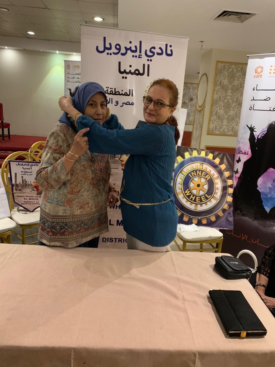 1- Hoda Fathi P. President pass the presidential necklace to Rasha Bahgat the President