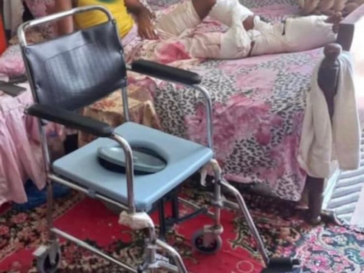 A wheel chair donation for unable to walk man