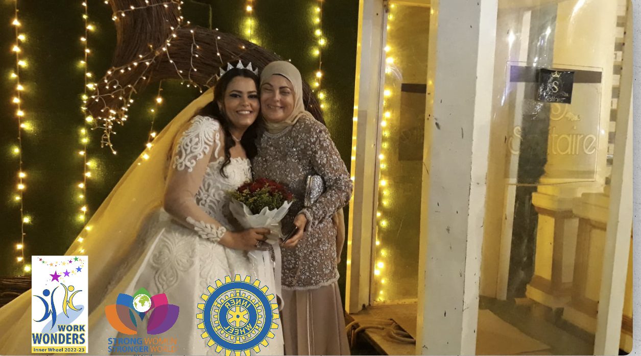1- A donated wedding dress By a club member to be worn by the bride