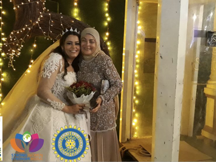 1- A donated wedding dress By a club member to be worn by the bride