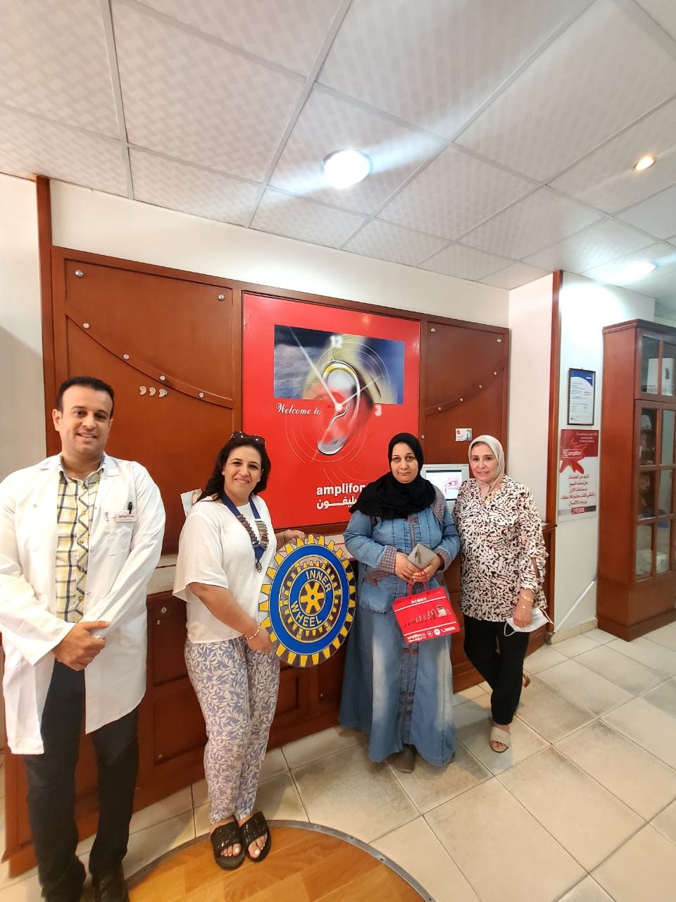 Members of IWC of Alexandria El Nozha Provided a women with a hearing aid