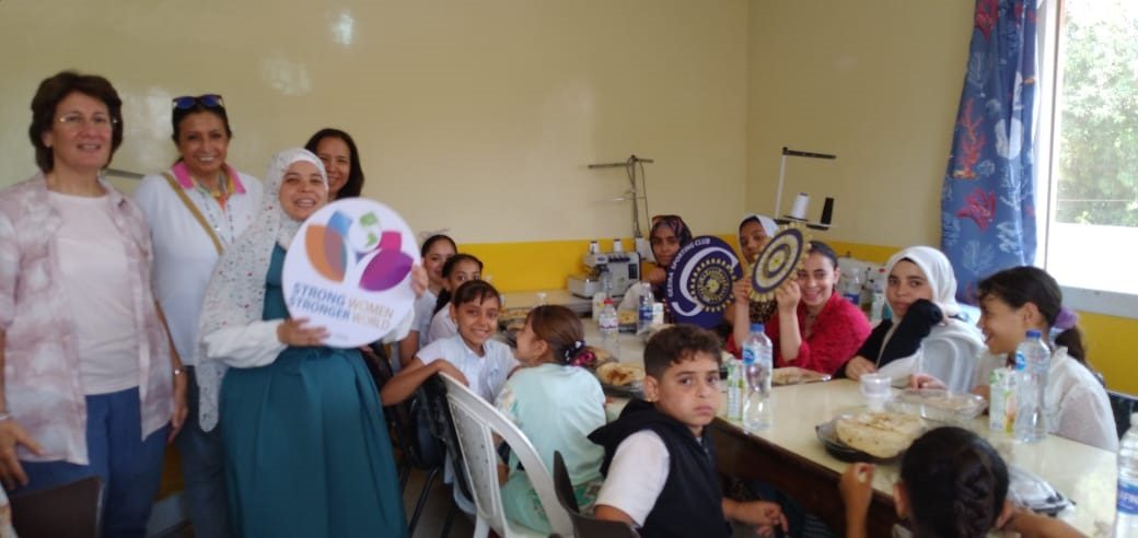 2- Members of IWC of El Gwzira Sporting Club during the lunch at Nahdet El Mansoureya