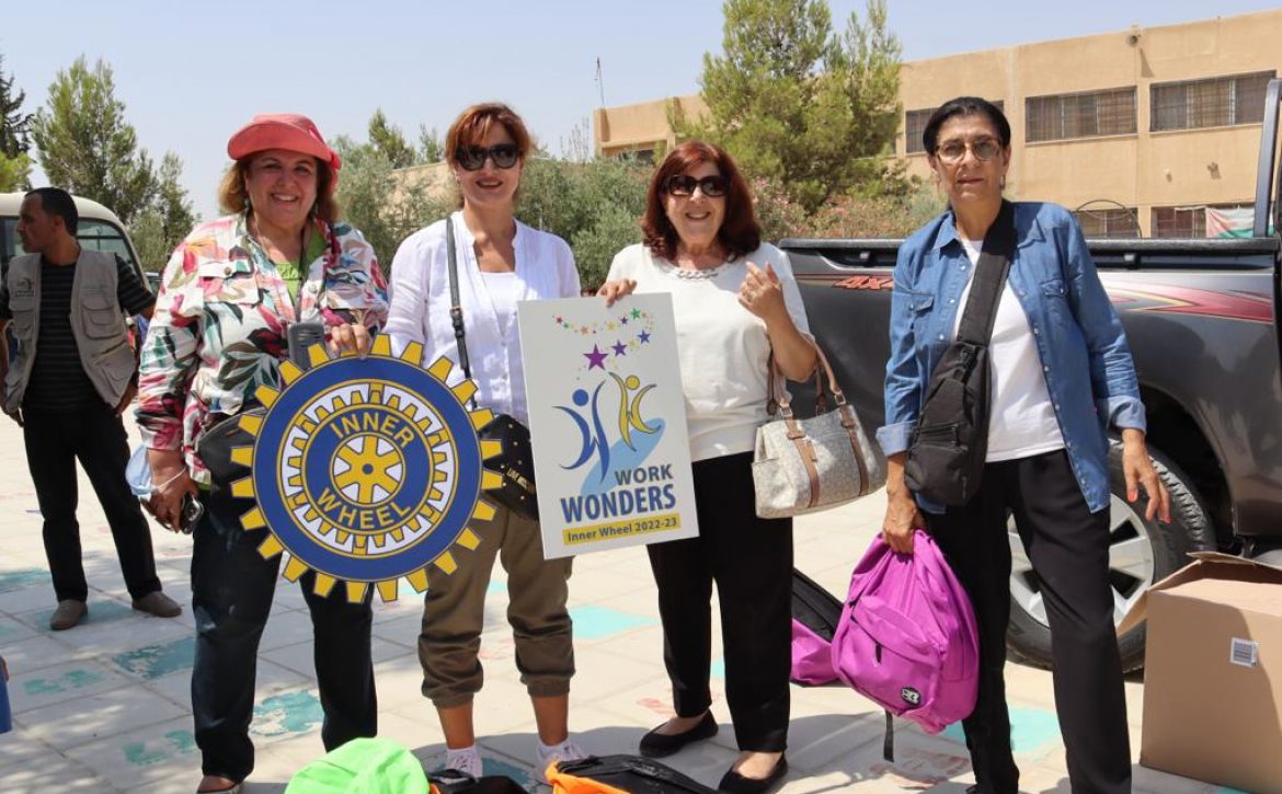 1-Mrs.Vivian Anz President of IWC of Amman & Mrs. Abeer Dajani Vice D.Chairman & members of the Club with the Donated School bags