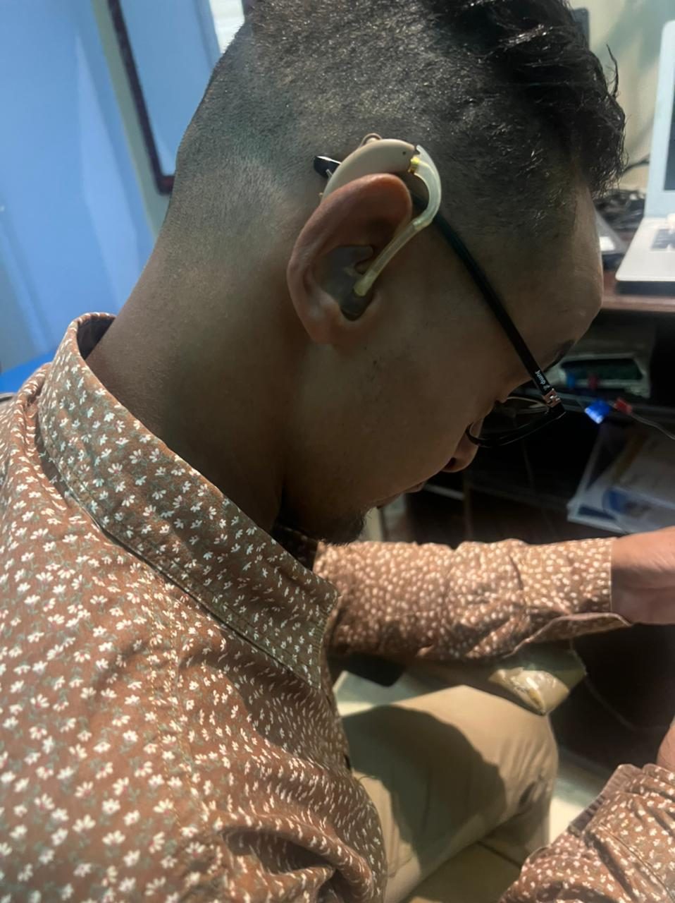 1-One hearing aid behind-the-ear