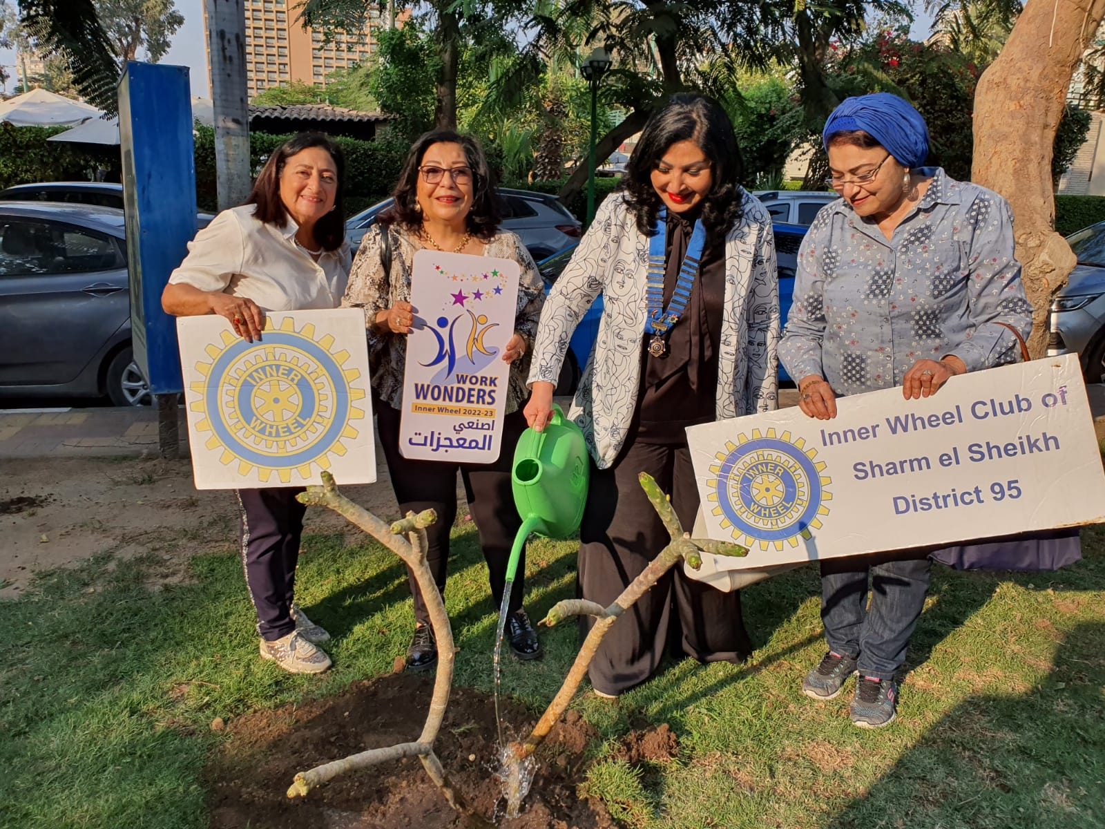 1- President and members of IWC of Sharm El Sheikh Planted 3 beautiful trees & scented shrubs
