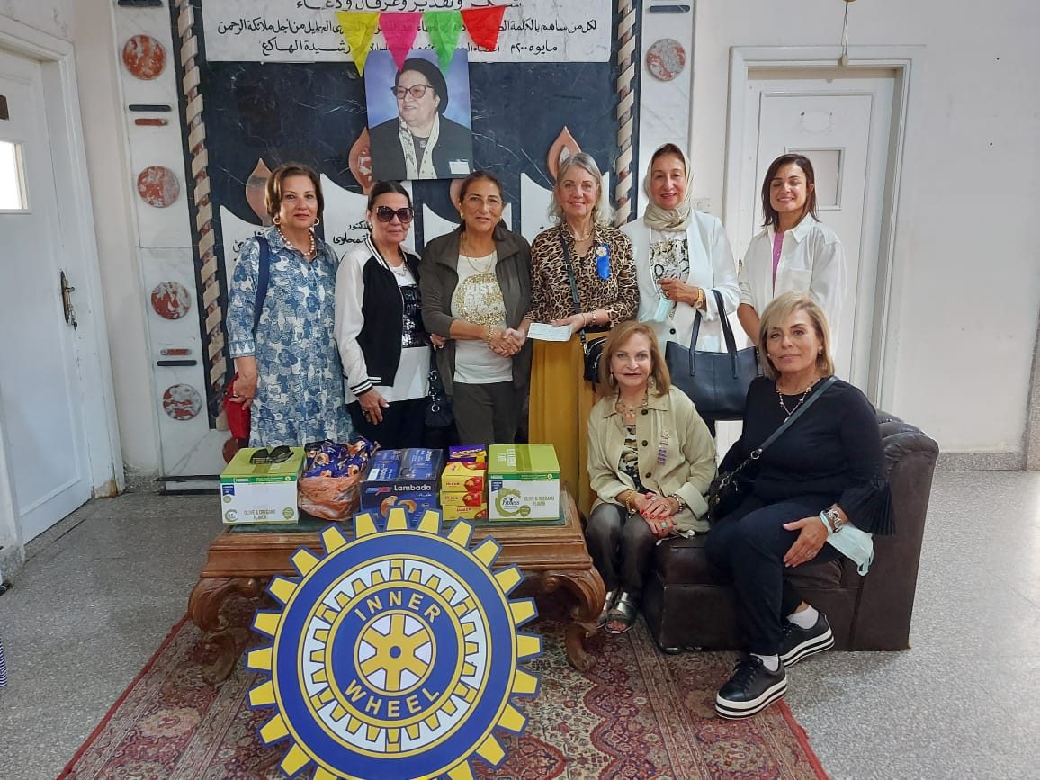 2-President of IWC of Alexandria East donated a check to Life at all association