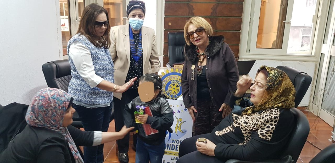 3- Members of IWC of Alexandria Meditarreanian offer some sweets (2)