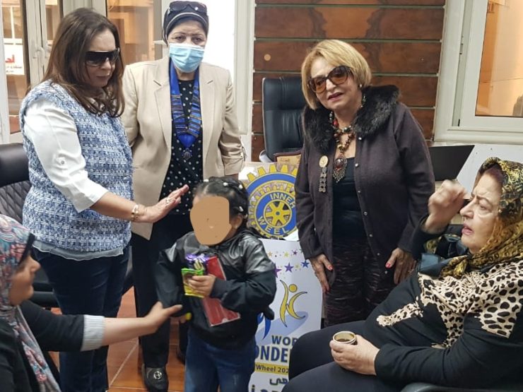 3- Members of IWC of Alexandria Meditarreanian offer some sweets (2)