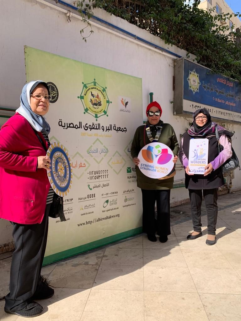 President & Club members of IWC of Giza Pyramids made a donation for construction of a water well ( 2