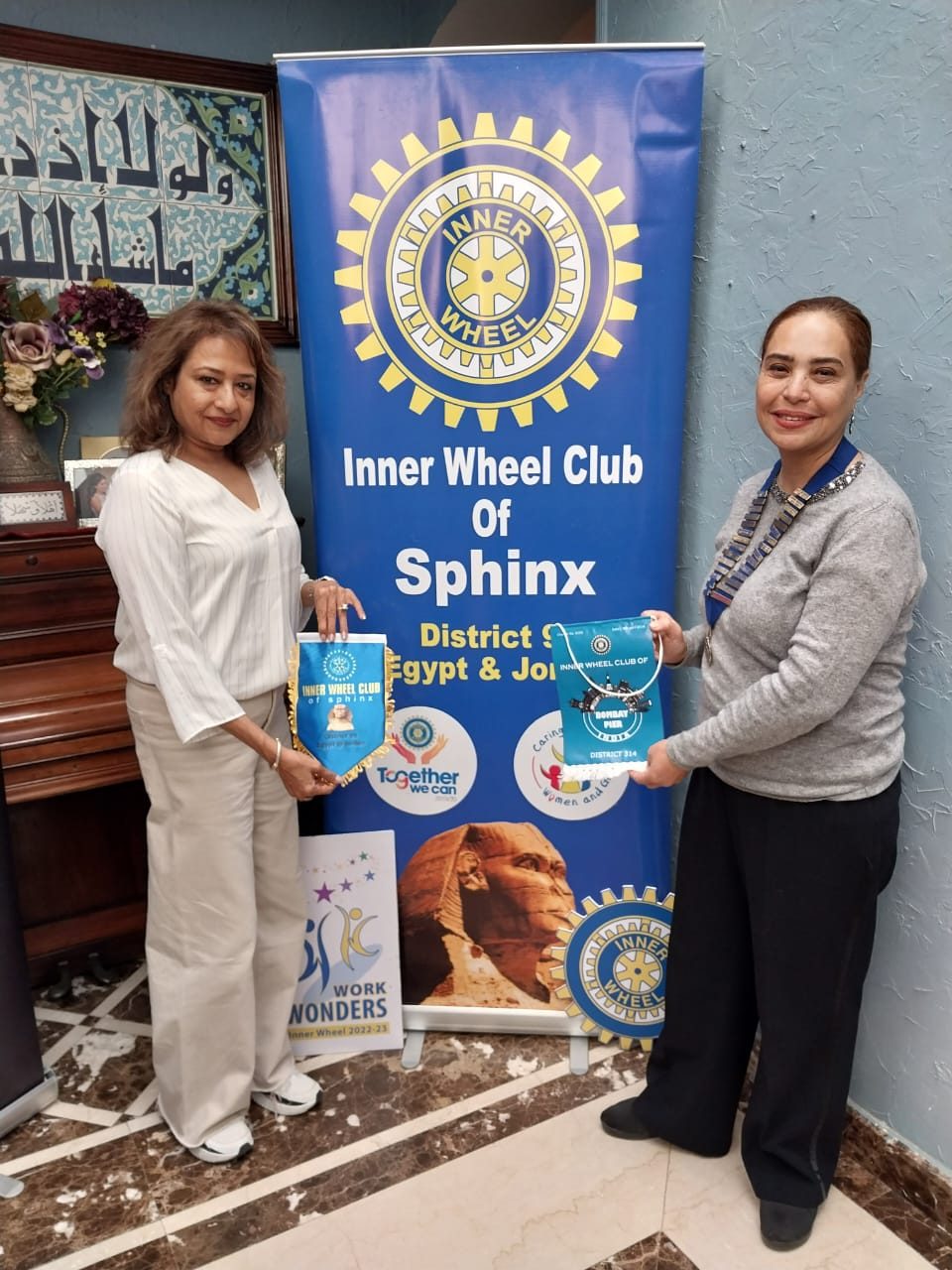 IWC of Sphinx & D 95 Exchange Flags with IWC of Bombay Bayer, District 314