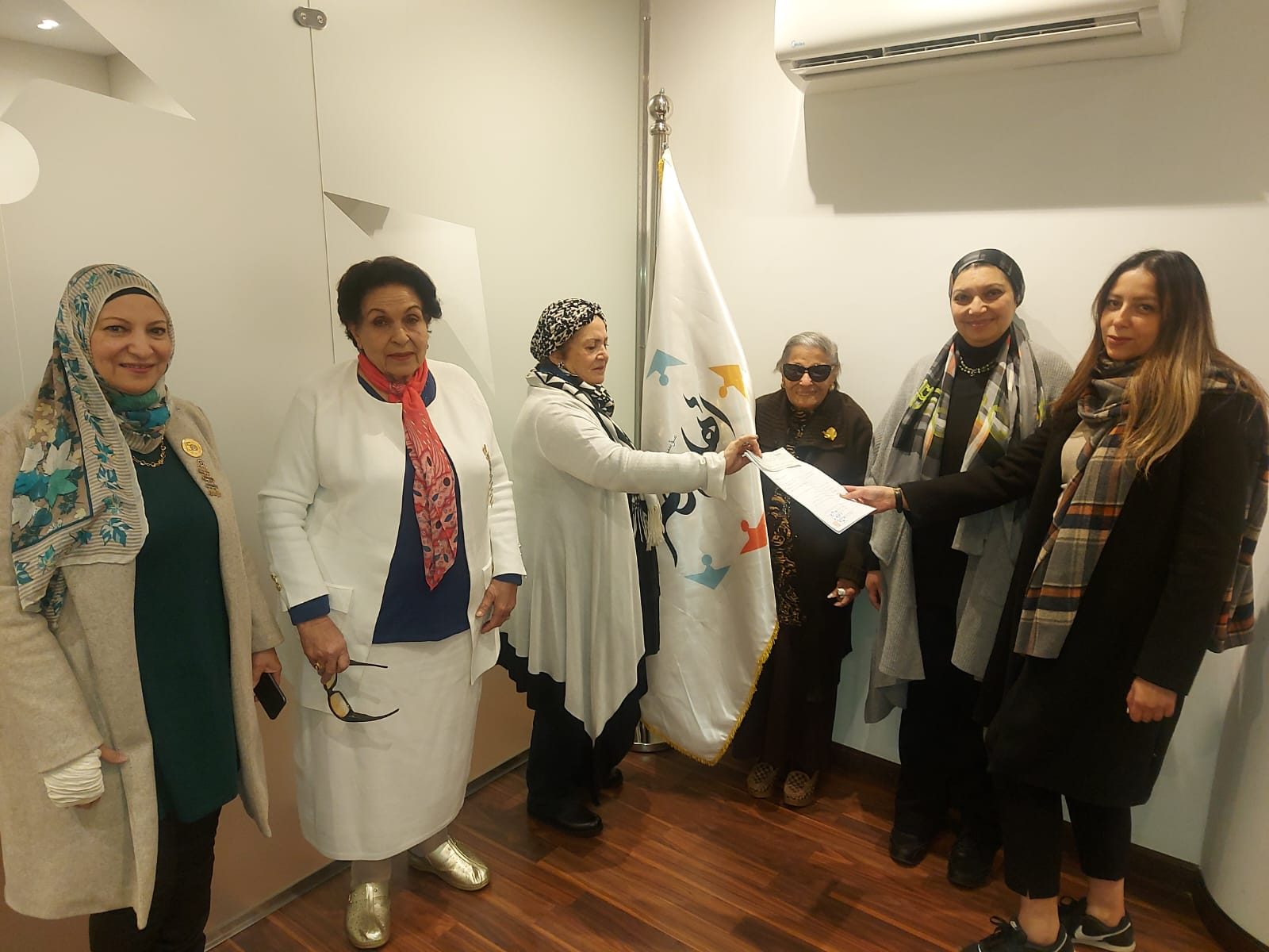 1–IWC of Heliopolis donated a cheque to “Ahl Misr Hospital “ for Burns