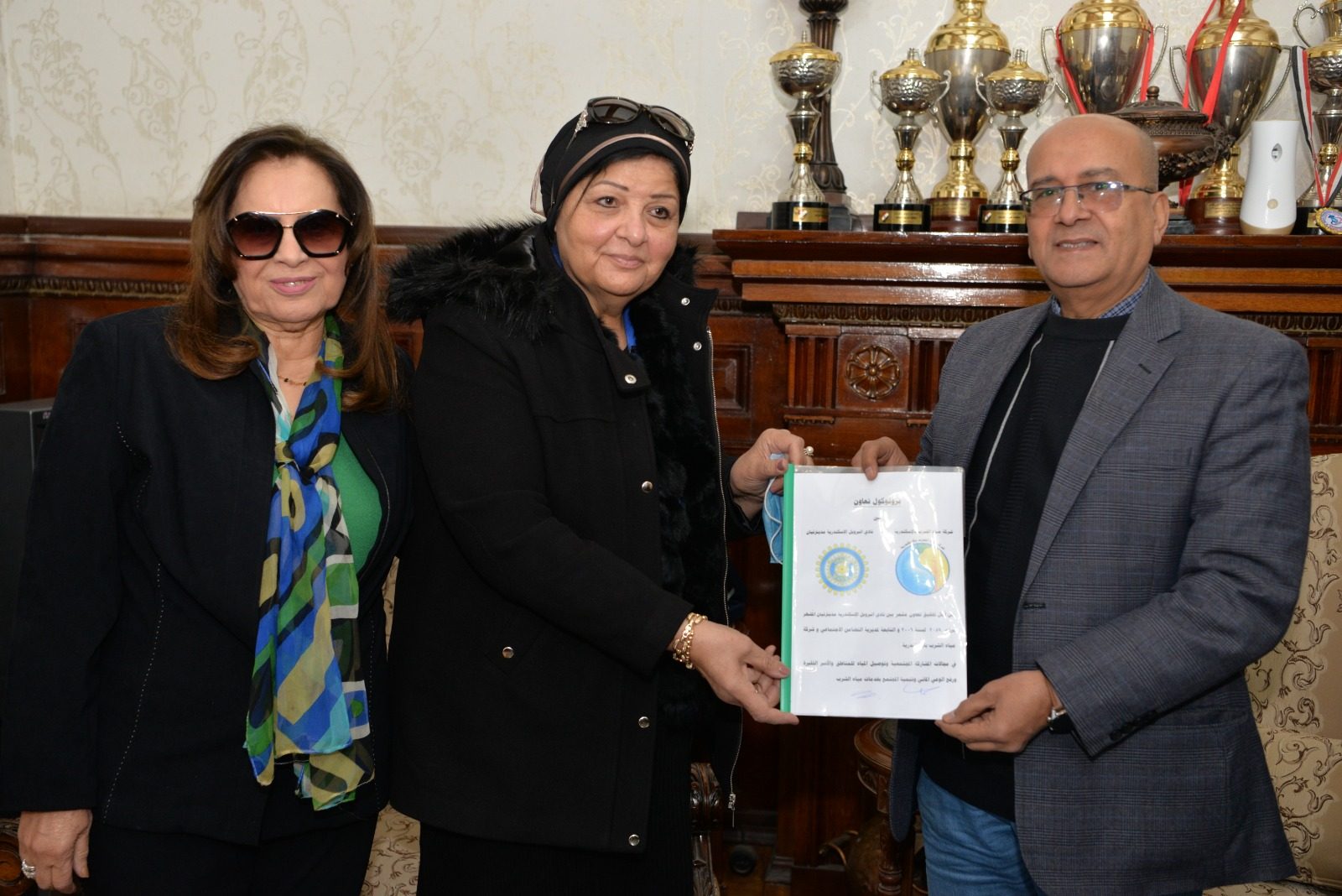 1-The cheif director of the company handed over to the club a certificate of appreciation.