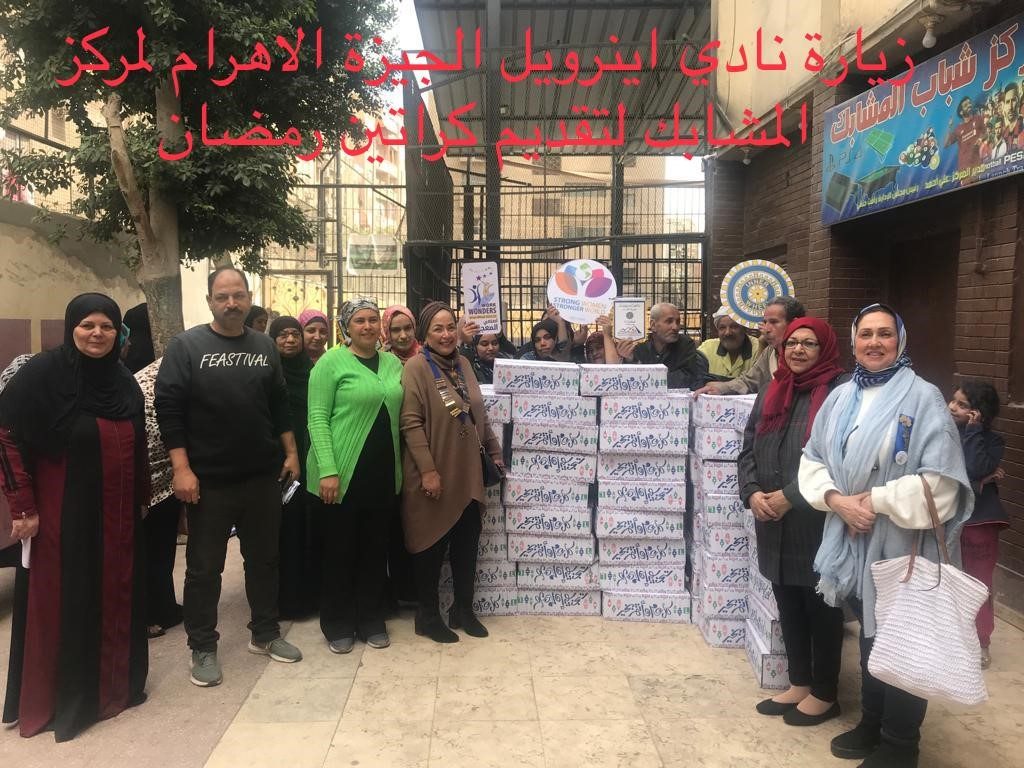 1-IWC of Giza Pyramids presents 100 cartoons of goodness to Literacy Class Students