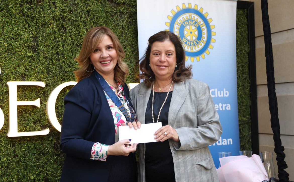 1-President of IWC of Petra handed over a donation to the Jordan Education for Women Empowerment and Learning Society
