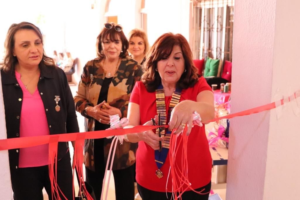 1-The NR of the Ms. Suzan Al-Kilani, club President Mrs. Vivian Anz Qaqish cut the opening ribbon
