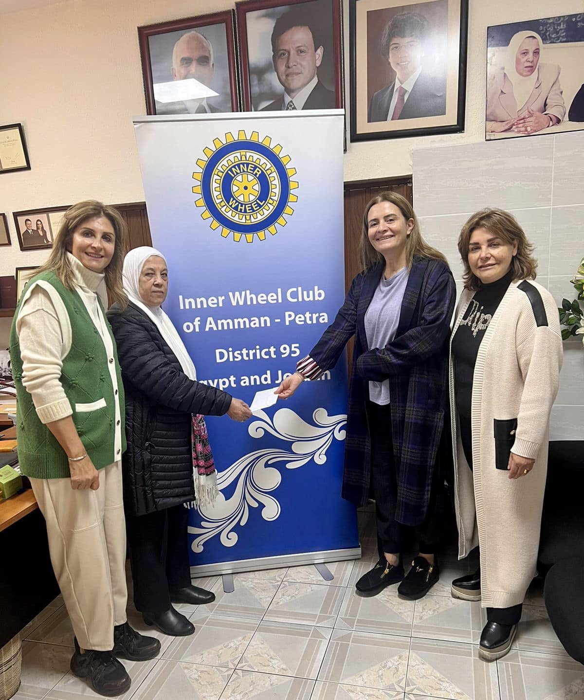 IWC of Petra distributed clothing Coupons to Orphan Children of the Families Development Charity Association “